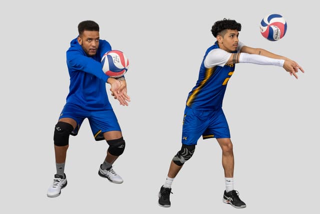 Studio action photo of two college volleyball players on a white background; removing distractions and unwanted elements
